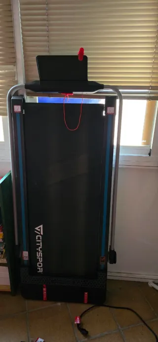 Cinta de correr plegable y bicicleta eliptica.