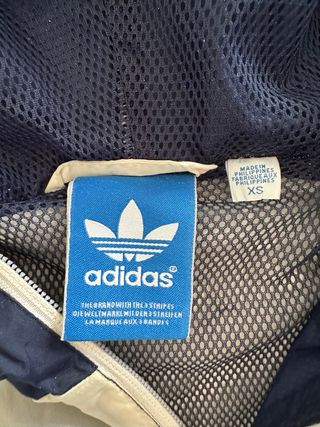 Giacca Adidas blu e bianca