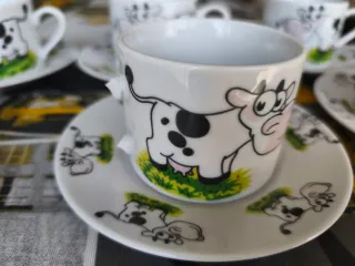 Juego de 6 tazas de café con platillos
