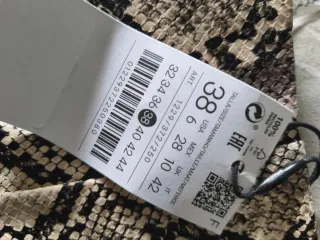 Falda estampado serpiente talla M nueva, polipiel