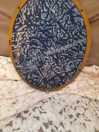 Cornice ovale in legno marrone