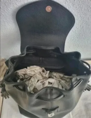 Bolso negro con flecos