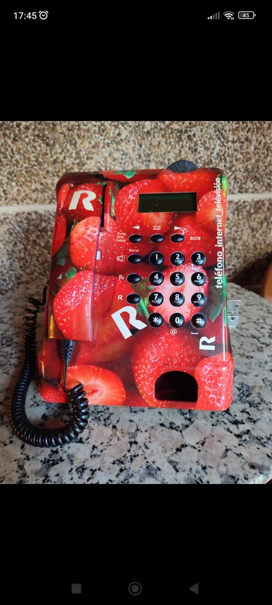 Antigua cabina de teléfono de monedas