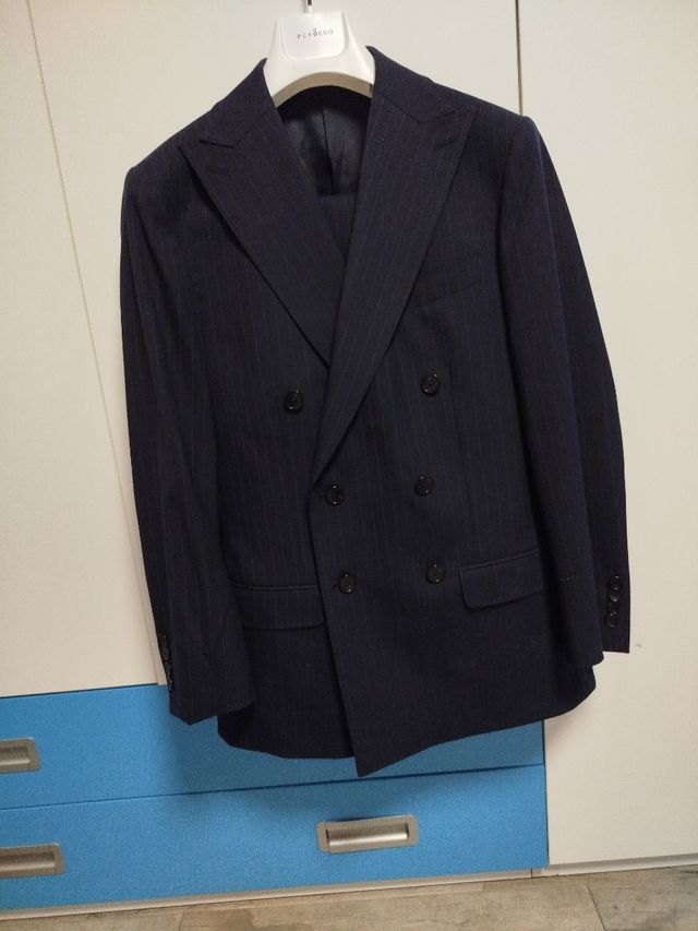 Traje de chaqueta rayas azul.