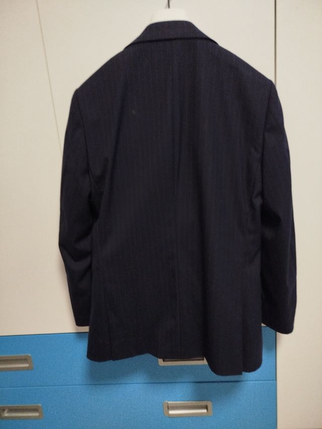 Traje de chaqueta rayas azul.