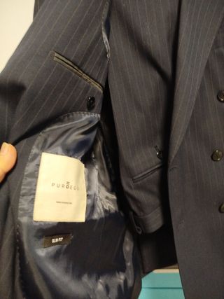 Traje de chaqueta rayas azul.