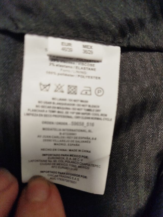 Traje de chaqueta rayas azul.