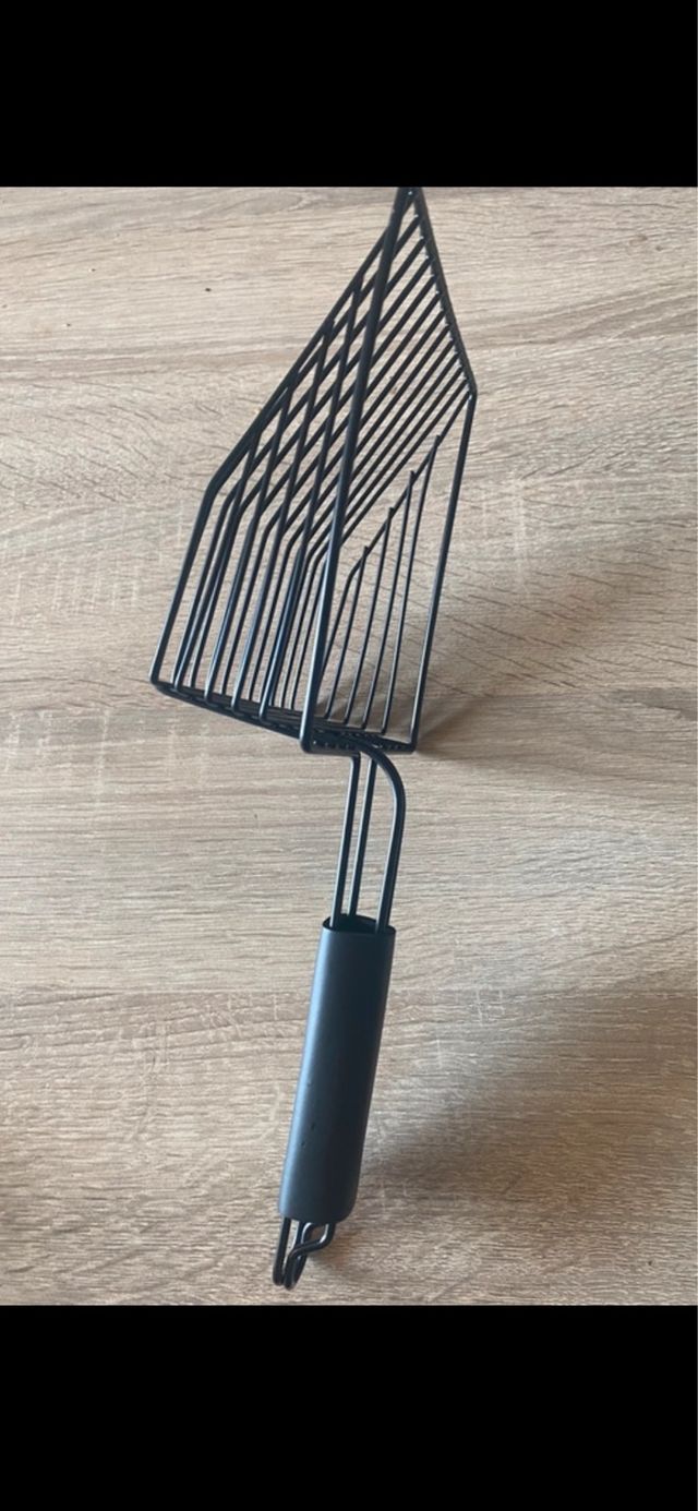 Pala para arena de gato