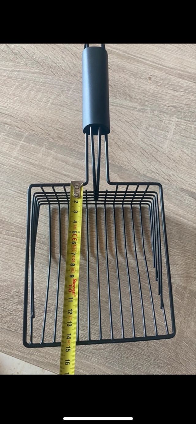 Pala para arena de gato