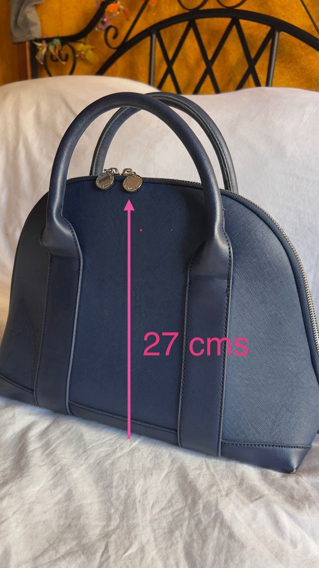 Bolso cómodo y amplio.