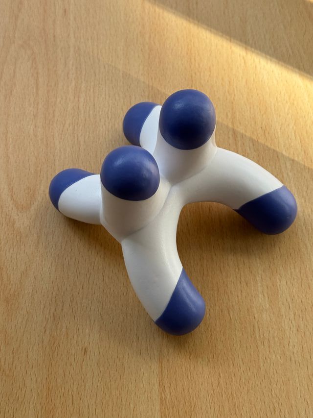 Masajeador cuello azul y blanco