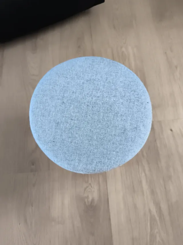 Reposapiés taburete redondo tapizado gris