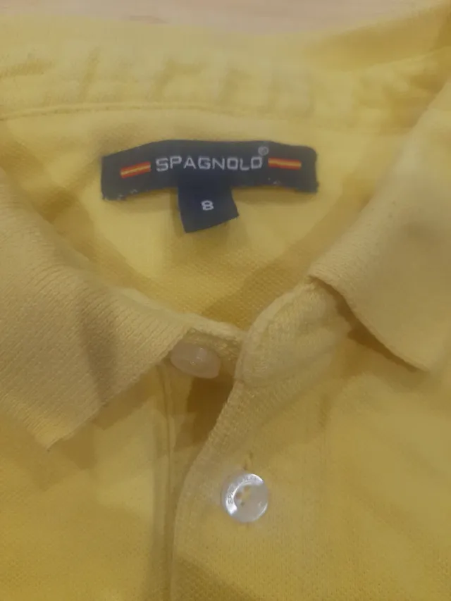 Polo giallo da bambino Spagnolo