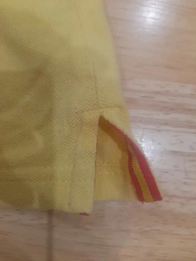 Polo giallo da bambino Spagnolo