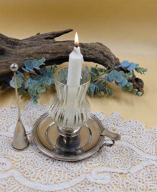 Bugia in metallo con lume in vetro