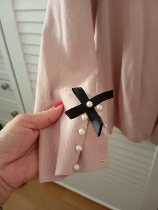 Torera rosa con detalle en puños