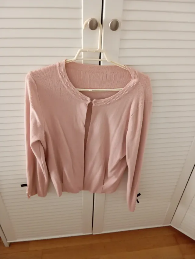 Torera rosa con detalle en puños