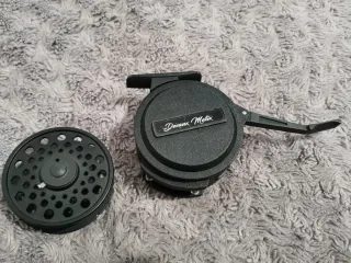 Carrete de pesca Devaux Matix + recambio