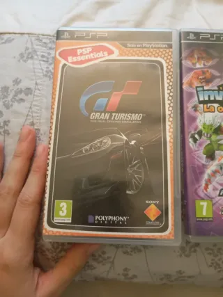 PSP Gran Turismo y Invizimals La Otra Dimensión