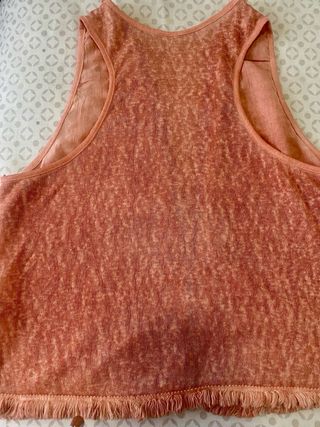 Chaleco con lentejuelas y flecos