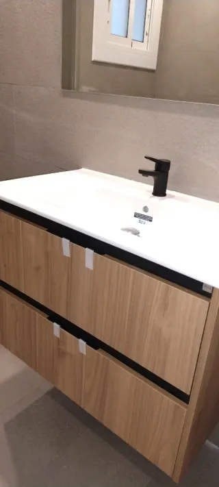 Instalación de  muebles  lavado, banio