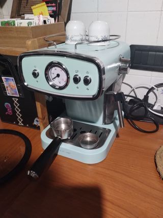 Macchinetta caffè argento e verde acqua