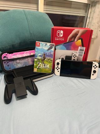 Nintendo Switch OLED Blanca + Zelda: BOTW + Fundas