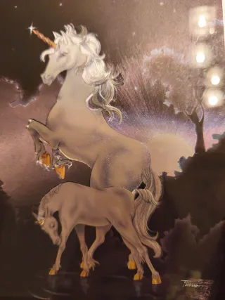 Cuadro de unicornios en papel