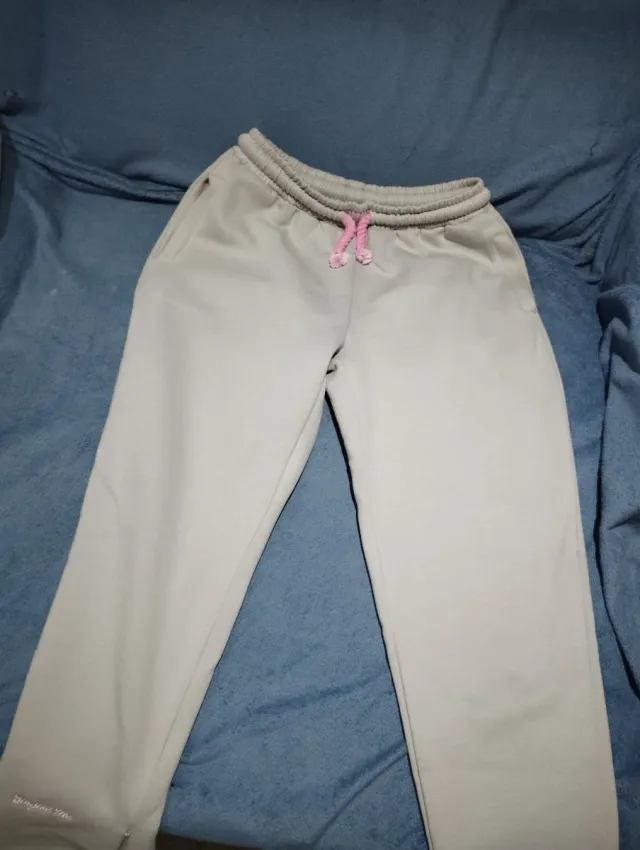 Chándal Syna World gris y rosa