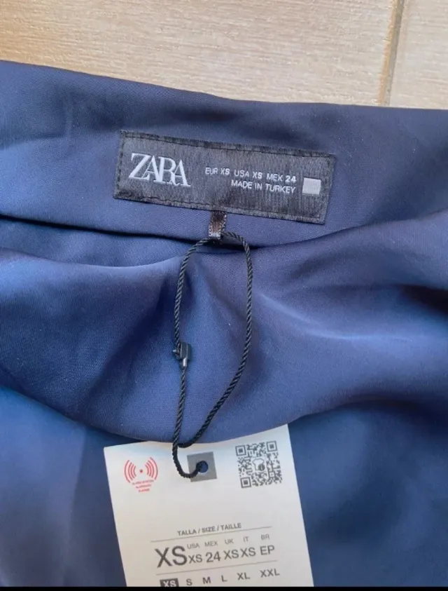 Falda midi satinada azul talla XS