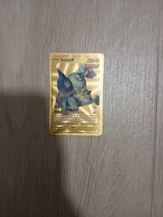 Carta Pokémon Golurk V Dorada