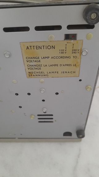 Proyector de diapositivas y 15 cajas