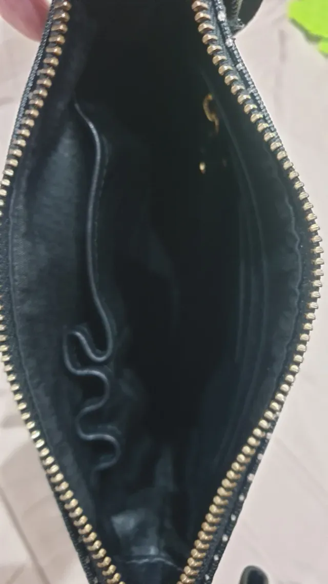 Mala tiracolo TOUS preta e dourada