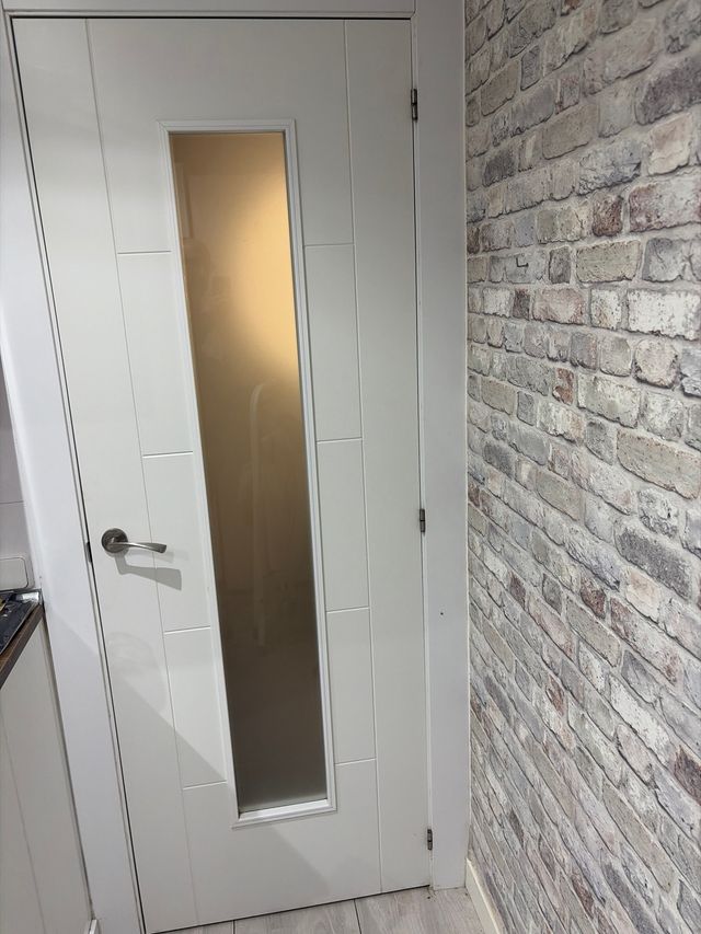 Puerta maciza interior con cristal