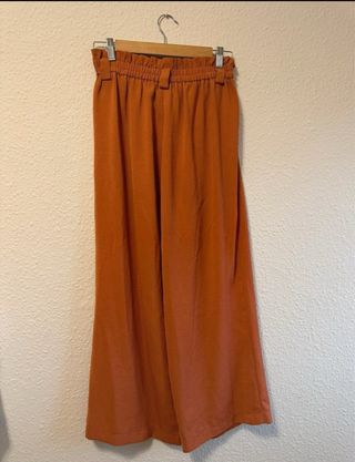 Pantalones anchos elegantes color naranja