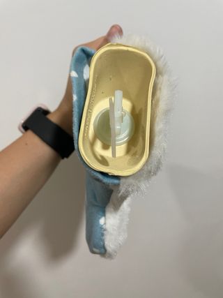 Bolsa de agua caliente con funda de peluche
