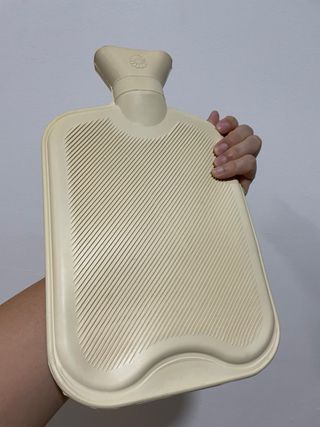 Bolsa de agua caliente con funda de peluche