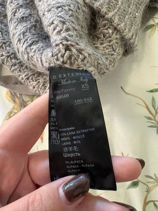 Gilet in maglia grigio con dettagli brillanti