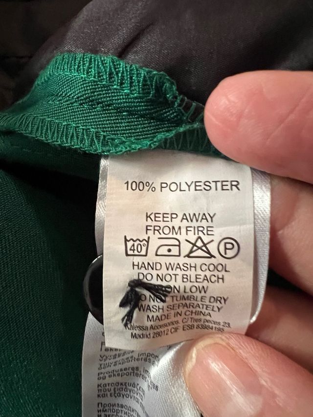 Pantalones Kling verdes con raya lateral negra