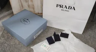Scatola Prada maxi e shopper bianca