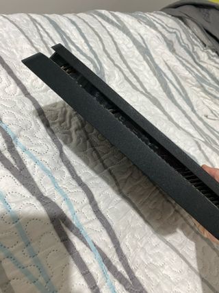 PS4 Negra y dos mandos