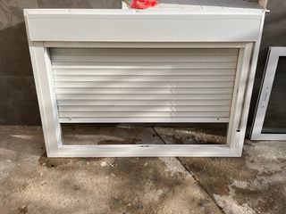 Ventana Climalit y reja y mosquetera