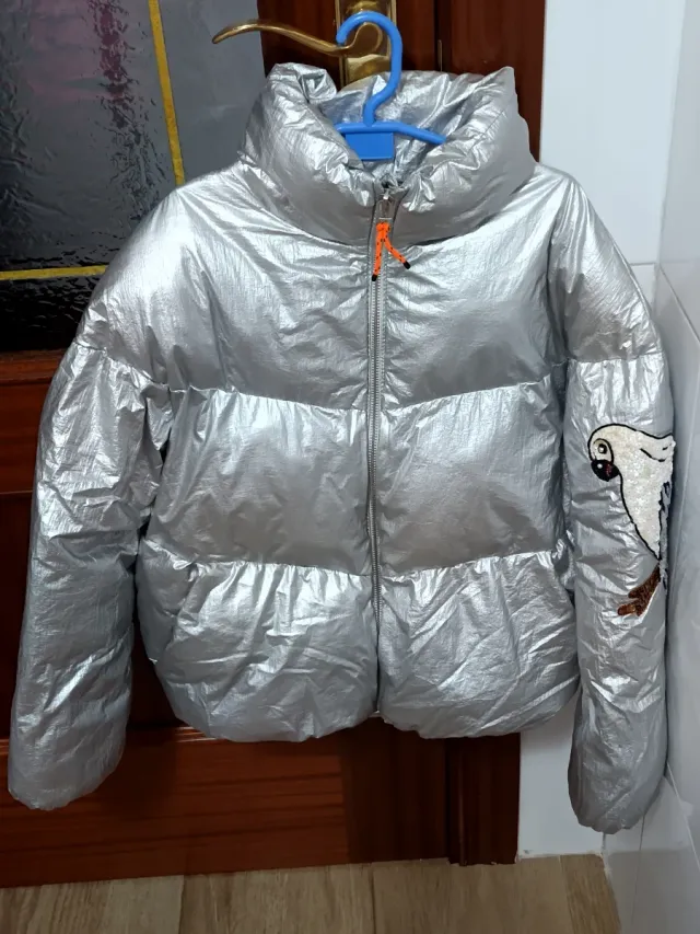 Cazadora plateada niña