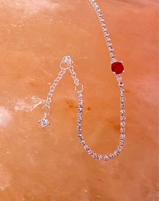 Pulsera tenis con perla roja y circonitas