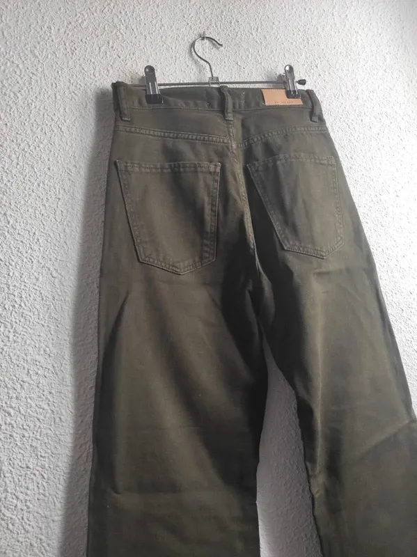 Pantalón MANGO mom jeans pata ancha bootcut verde