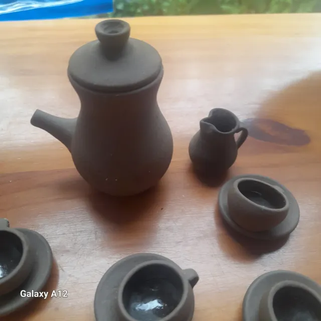 Juego de té miniatura de barro