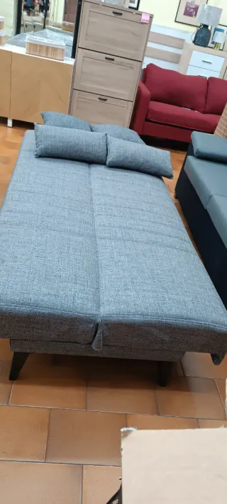 Sofá cama gris de tela
