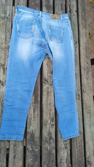 Jeans strappati uomo taglia J
