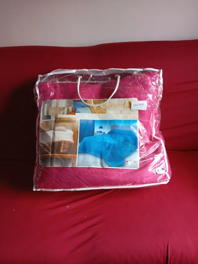 Manta rosa de forro polar