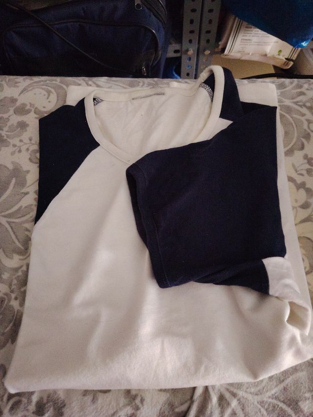 Camiseta Nike manga ranglan blanca y negra